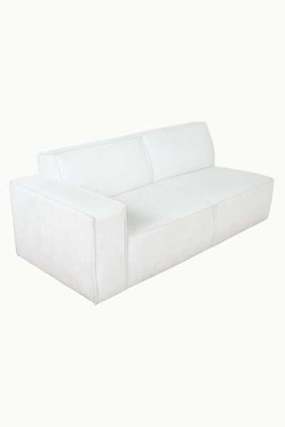 Canapé magnum en tissu chenille écru, modèle d’angle avec assises larges et lignes épurées