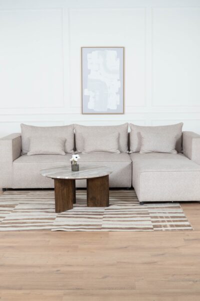 canapé_modulable_monte_carlo_tissus_chenille_beige (9) Canapé modulable en tissu chenille beige, composé de plusieurs modules avec coussins assortis"