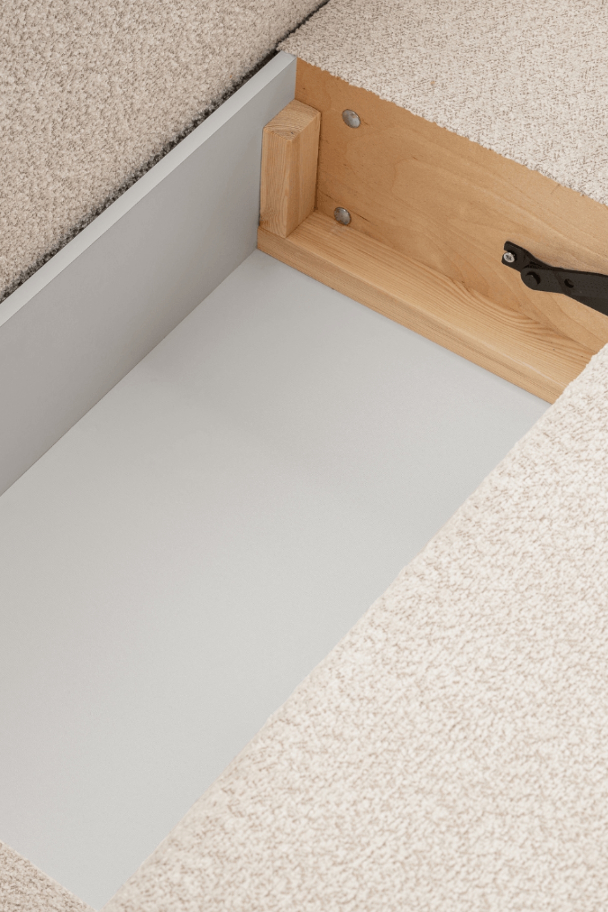 Canapé aulfa coffre et convertible en laine bouclée, modèle d’angle avec assises confortable et lignes arrondies