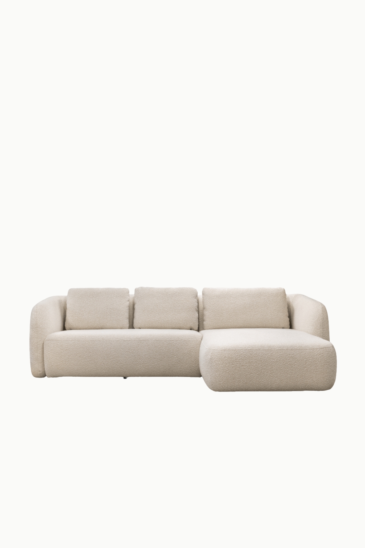 Canapé d’angle marina en laine bouclée écru, forme arrondie et assise confortable
