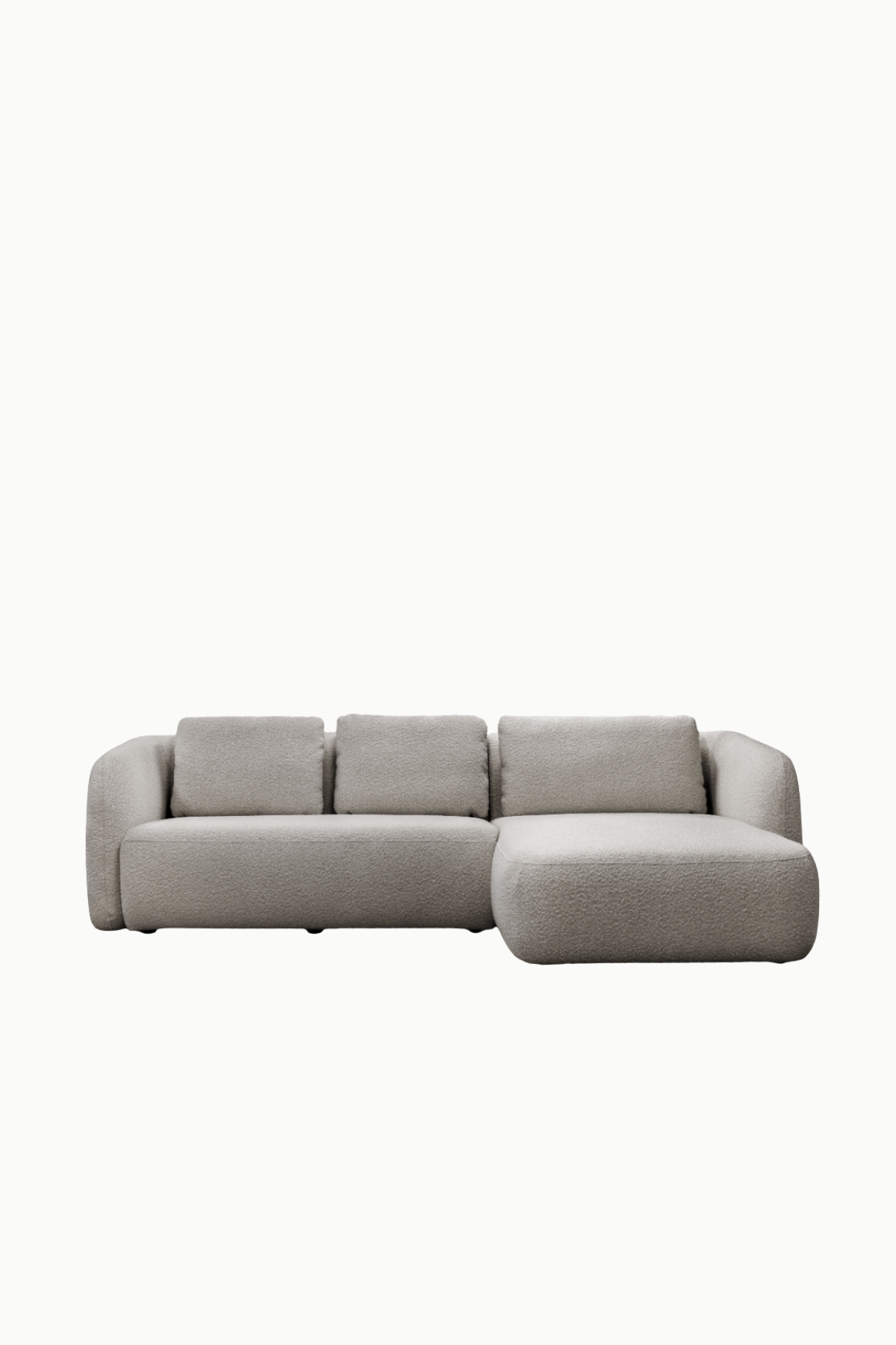 Canapé d’angle marina en laine bouclée grise, forme arrondie et assise confortable