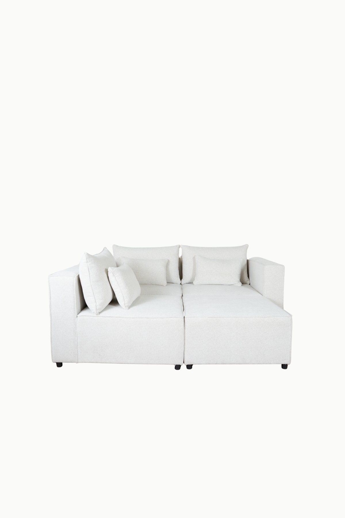 canapé_modulable_monte_carlo_tissus_chenille_écru (1) Canapé modulable en tissu chenille écru, composé de plusieurs modules avec coussins assortis"