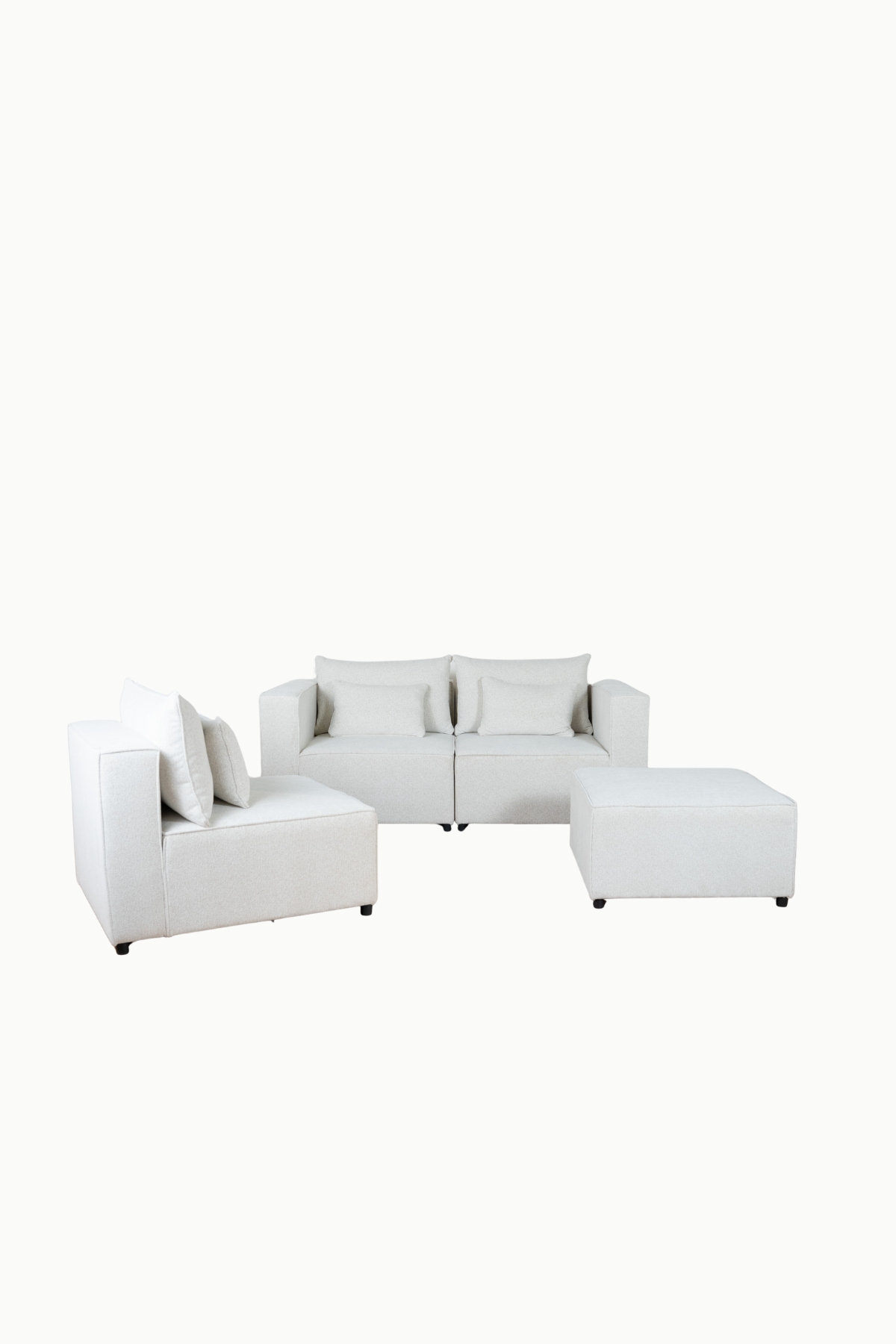 canapé_modulable_monte_carlo_tissus_chenille_écru (2) Canapé modulable en tissu chenille écru, composé de plusieurs modules avec coussins assortis"