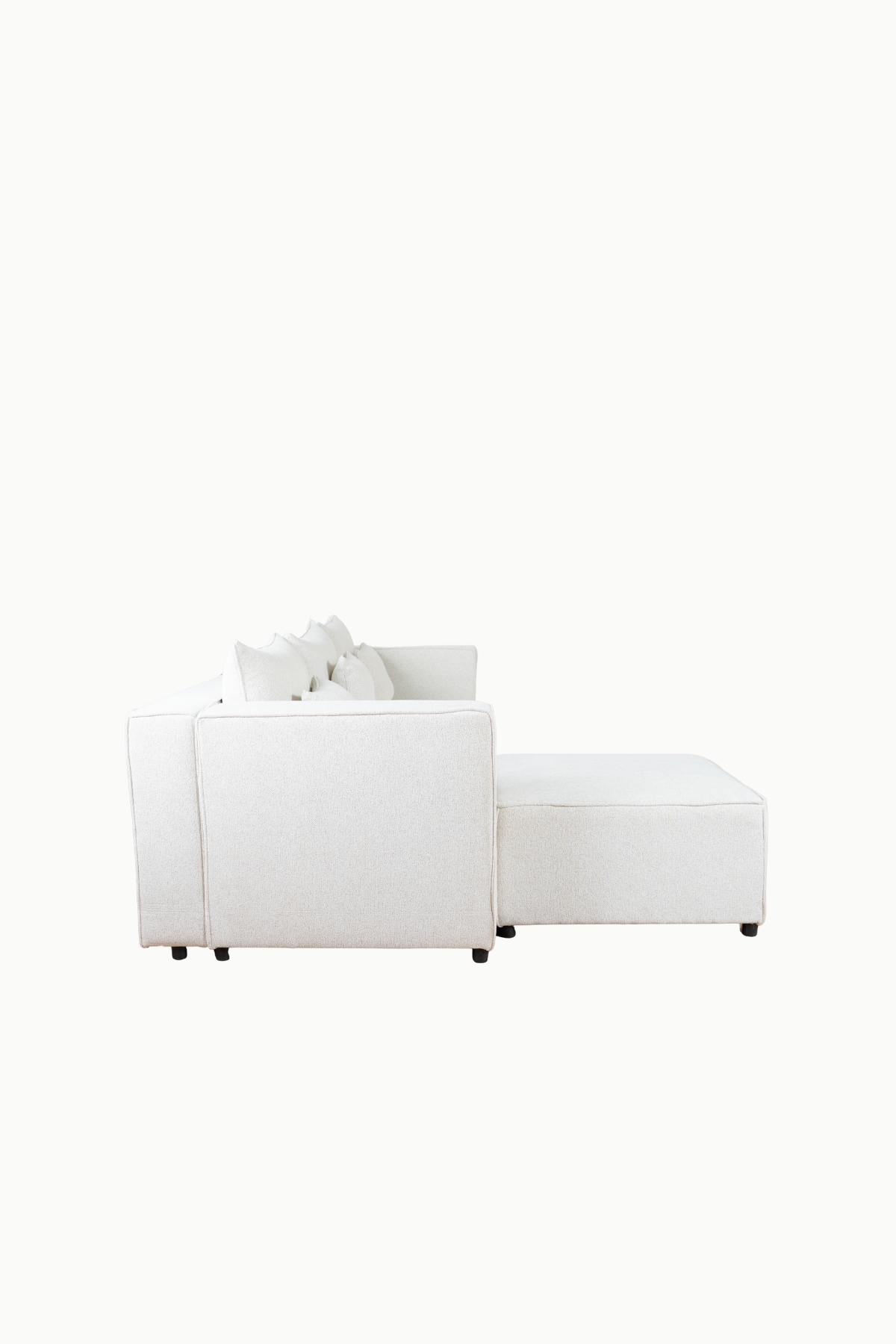 canapé_modulable_monte_carlo_tissus_chenille_écru (4) Canapé modulable en tissu chenille écru, composé de plusieurs modules avec coussins assortis"