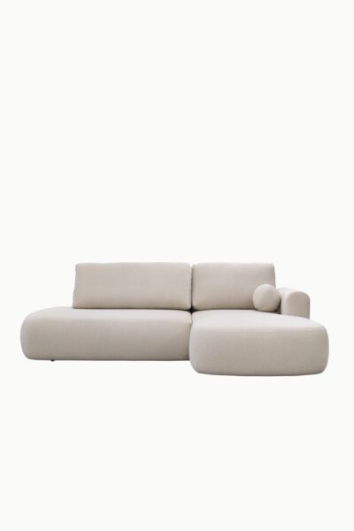 canapé d’angle Aron en laine bouclée beige, forme arrondie moderne, convertible avec coffre de rangement intégré, assise profonde et accoudoir gauche